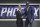 Arizona's Deandre Ayton, right, poses with NBA Commissioner Adam Silver after he was picked first overall by the Phoenix Suns during the NBA basketball draft in New York, Thursday, June 21, 2018. (AP Photo/Kevin Hagen)