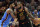 Cleveland Cavaliers' LeBron James, right, drives past Oklahoma City Thunder's Paul George in the second half of an NBA basketball game, Saturday, Jan. 20, 2018, in Cleveland. (AP Photo/Tony Dejak)