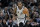 San Antonio Spurs forward Kawhi Leonard (2) moves the ball up court during the second half of an NBA basketball game against the Denver Nuggets, Saturday, Jan. 13, 2018, in San Antonio. San Antonio won 112-80. (AP Photo/Eric Gay)