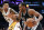 San Antonio Spurs' Kawhi Leonard, right, drives past Los Angeles Lakers' Brandon Ingram during the second half of an NBA basketball game, Sunday, Feb. 26, 2017, in Los Angeles. (AP Photo/Jae C. Hong)