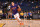 OAKLAND, CA - APRIL 1:  Devin Booker #1 of the Phoenix Suns warms up prior to the game against the Golden State Warriors on April 1, 2018 at ORACLE Arena in Oakland, California. NOTE TO USER: User expressly acknowledges and agrees that, by downloading and or using this photograph, user is consenting to the terms and conditions of Getty Images License Agreement. Mandatory Copyright Notice: Copyright 2018 NBAE (Photo by Noah Graham/NBAE via Getty Images)