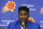 Phoenix Suns' Deandre Ayton answers a question during a news conference as the team introduces its new players after the NBA basketball draft Friday, June 22, 2018, in Phoenix. (AP Photo/Ross D. Franklin)