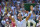TOPSHOT - Spain's Rafael Nadal celebrates after winning against Australia's Alex De Minaur during their men's singles third round match on the sixth day of the 2018 Wimbledon Championships at The All England Lawn Tennis Club in Wimbledon, southwest London, on July 7, 2018. - Nadal won the match 6-1, 6-2, 6-4. (Photo by Ben STANSALL / AFP) / RESTRICTED TO EDITORIAL USE        (Photo credit should read BEN STANSALL/AFP/Getty Images)