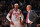 NEW YORK - JANUARY 11: Carmelo Anthony #7 of the New York Knicks talks to head coach Mike D'Antoni during the game against the Philadelphia 76ers on January 11, 2012 at Madison Square Garden in New York, New York.  NOTE TO USER: User expressly acknowledges and agrees that, by downloading and/or using this Photograph, user is consenting to the terms and conditions of the Getty Images License Agreement. Mandatory Copyright Notice: Copyright 2012 NBAE   (Photo by Jesse D. Garrabrant/NBAE via Getty Images)