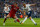 Liverpool's Croatian defender Dejan Lovren (L) vies with Tottenham Hotspur's English striker Harry Kane during the English Premier League football match between Tottenham Hotspur and Liverpool at Wembley Stadium in London, on October 22, 2017. / AFP PHOTO / IKIMAGES / Ian KINGTON / RESTRICTED TO EDITORIAL USE. No use with unauthorized audio, video, data, fixture lists, club/league logos or 'live' services. Online in-match use limited to 45 images, no video emulation. No use in betting, games or single club/league/player publications.  /         (Photo credit should read IAN KINGTON/AFP/Getty Images)