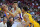 LAS VEGAS, NV - JULY 10:  Kevin Knox #20 of the New York Knicks looks to drive against Josh Hart #5 of the Los Angeles Lakers during the 2018 NBA Summer League at the Thomas & Mack Center on July 10, 2018 in Las Vegas, Nevada. The Lakers defeated the Knicks 109-92. NOTE TO USER: User expressly acknowledges and agrees that, by downloading and or using this photograph, User is consenting to the terms and conditions of the Getty Images License Agreement.  (Photo by Sam Wasson/Getty Images)