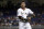 Miami Marlins' Starlin Castro walks off after striking out during a baseball game against the San Francisco Giants, Tuesday, June 12, 2018, in Miami. (AP Photo/Lynne Sladky)