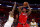 DETROIT, MI - JULY 13:  Al Harrington #3 of Trilogy attempts a shot while being guarded by Josh Powell #21 of the Killer 3's during BIG3 - Week Four at Little Caesars Arena on July 13, 2018 in Detroit, Michigan. (Photo by Gregory Shamus/BIG3/Getty Images)