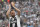 Juventus' forward from Argentina Gonzalo Higuain applauds fans during the trophy ceremony following the Italian Serie A last football match of the season Juventus versus Verona, on May 19, 2018 at the Allianz Stadium in Turin. Juventus won their 34th Serie A title (scudetto) and seventh in succession. (Photo by Marco BERTORELLO / AFP)        (Photo credit should read MARCO BERTORELLO/AFP/Getty Images)