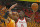 FILE - In this May 4, 2018, file photo, Utah Jazz center Rudy Gobert (27) defends against Houston Rockets center Clint Capela (15) during the first half in Game 3 of an NBA basketball second-round playoff series in Salt Lake City. The league is taking notice that Capela is one of the pivotal pieces to Houston’s success as the team prepares for its showdown with Golden State in the Western Conference finals starting Monday. “What he does is as good or better than anybody in the league without a doubt,” coach Mike D’Antoni said. (AP Photo/Rick Bowmer, File)