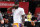 LAS VEGAS, NV - JULY 15: Head Coach Tyronn Lue of the Cleveland Cavaliers speaks with LeBron James #23 of the Los Angeles Lakers during the game against the Detroit Pistons during the 2018 Las Vegas Summer League on July 15, 2018 at the Thomas & Mack Center in Las Vegas, Nevada. NOTE TO USER: User expressly acknowledges and agrees that, by downloading and/or using this photograph, user is consenting to the terms and conditions of the Getty Images License Agreement. Mandatory Copyright Notice: Copyright 2018 NBAE (Photo by Garrett Ellwood/NBAE via Getty Images)