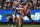MELBOURNE, AUSTRALIA - JULY 15: Jamie Cripps of the Eagles is tackled by Tom Langdon of the Magpies (left) and Tom Phillips of the Magpies (right) during the 2018 AFL round 17 match between the Collingwood Magpies and the West Coast Eagles at the Melbourne Cricket Ground on July 15, 2018 in Melbourne, Australia. (Photo by Michael Willson/AFL Media/Getty Images)