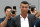 Portuguese footballer Cristiano Ronaldo surrounded by photographs looks on as he greets supporters outside the Juventus medical center at the Alliance stadium in Turin on July 16, 2018. - Cristiano Ronaldo arrived in Turin ahead of his official unveiling as Juventus' superstar summer signing on July 17. (Photo by Isabella Bonotto / AFP)        (Photo credit should read ISABELLA BONOTTO/AFP/Getty Images)