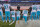 Miami Dolphins' Jordan Phillips (97) stands during the national anthem, but shows support for the protest as he puts an arm on the shoulder of kneeling teammate, Kenny Stills (10), Michael Thomas (31) and Julius Thomas (89) before an NFL football game against the Carolina Panthers in Charlotte, N.C., Monday, Nov. 13, 2017. The Panthers won 45-21. (AP Photo/Bob Leverone)