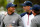 MEDINAH, IL - SEPTEMBER 25:  Tiger Woods talks with Jim Furyk during the USA team photocall during the second preview day of The 39th Ryder Cup at Medinah Country Golf Club on September 25, 2012 in Medinah, Illinois.  (Photo by Jamie Squire/Getty Images)