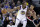 Golden State Warriors' Kevin Durant (35) is defended by Portland Trail Blazers' CJ McCollum (3) during the second half of an NBA basketball game Monday, Dec. 11, 2017, in Oakland, Calif. The Warriors won, 111-104. (AP Photo/Marcio Jose Sanchez)