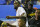 Kevin Durant of the Golden State Warriors and the NBA Finals Most Valuable Player, throws an autographed basketball to his fans following an exhibition basketball game with Philippine basketball players at the Smart Araneta Coliseum northeast of Manila, Philippines, Sunday, July 8, 2018. Durant is in the Philippines for the second time to conduct basketball clinics and to launch his Nike 'KD 11' basketball shoes. (AP Photo/Bullit Marquez)