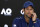 Serbia's Novak Djokovic gestures during a press conference at the Australian Open tennis championships in Melbourne, Australia, Saturday, Jan. 13, 2018. (AP Photo/Vincent Thian)