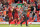 Liverpool's German manager Jurgen Klopp (R) applauds supporters on the pitch after the English Premier League football match between Liverpool and West Ham United at Anfield in Liverpool, north west England on August 12, 2018. (Photo by Oli SCARFF / AFP) / RESTRICTED TO EDITORIAL USE. No use with unauthorized audio, video, data, fixture lists, club/league logos or 'live' services. Online in-match use limited to 120 images. An additional 40 images may be used in extra time. No video emulation. Social media in-match use limited to 120 images. An additional 40 images may be used in extra time. No use in betting publications, games or single club/league/player publications. /         (Photo credit should read OLI SCARFF/AFP/Getty Images)