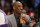 Los Angeles Lakers' Kobe Bryant, who is injured, drinks a BodyArmor Superdrink on the bench against the New York Knicks during an NBA Basketball game, Thursday, March 12, 2015, in Los Angeles. The Knicks won 101-94. Bryant is an investor in the upstart sports drink BODYARMOR. (AP Photo/Danny Moloshok)