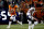 Denver Broncos quarterback Paxton Lynch (12) runs against the Chicago Bears during the second half of a preseason NFL football game, Saturday, Aug. 18, 2018, in Denver. (AP Photo/David Zalubowski)
