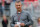 FILE - In this April 14, 2018, file photo, Ohio State coach Urban Meyer watches the NCAA college football team's spring game in Columbus, Ohio. Ohio State has placed Meyer on paid administrative leave while it investigates claims that his wife knew about allegations of abuse against an assistant coach years before he was fired last week. (AP Photo/Jay LaPrete, File)