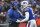 Buffalo Bills quarterback Tyrod Taylor (5) gestures while talking with head coach Sean McDermott against the Miami Dolphins during the first half of an NFL football game Sunday, December 17, 2017, in Orchard Park, N.Y. (AP Photo/Rich Barnes)