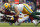 Green Bay Packers linebacker Clay Matthews (52) hits Washington Redskins quarterback Alex Smith (11) during the second half of an NFL football game, Sunday, Sept. 23, 2018 in Landover, Md. (AP Photo/Alex Brandon)