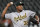 Oakland Athletics' Jeurys Familia delivers against the Baltimore Orioles in a baseball game, Tuesday, Sept. 11, 2018, in Baltimore. The Athletics won 3-2. (AP Photo/Gail Burton)