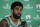Boston Celtics guard Kyrie Irving faces reporters at NBA basketball media day, Monday, Sept. 24, 2018, in Canton, Mass. (AP Photo/Steven Senne)
