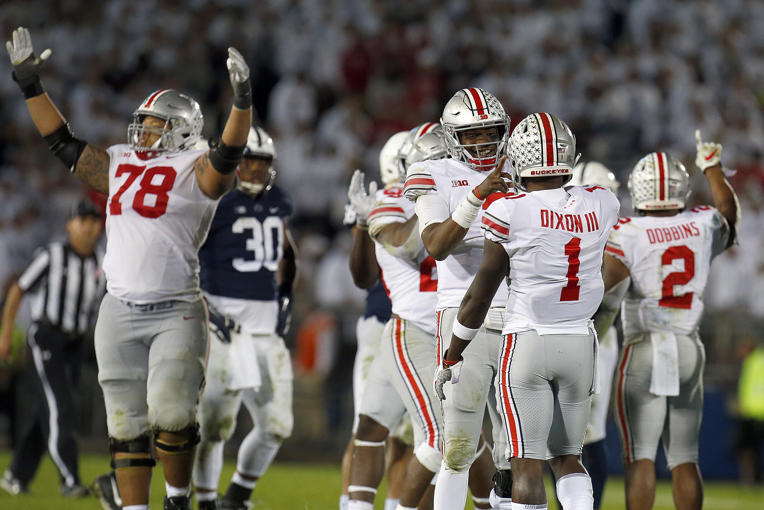 STATE COLLEGE, PA - SEPTEMBER 29: Dwayne Haskins #7 of the Ohio State Buckeyes celebrates with Johnnie Dixon #1 after defeating the Penn State Nittany Lions on September 29, 2018 at Beaver Stadium in State College, Pennsylvania. (Photo by Justin K. Aller/Getty Images)