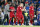 Liverpool's Xherdan Shaqiri, center and his teammates greet supporters a the end of the English Premier League soccer match between Chelsea and Liverpool at Stamford Bridge stadium in London, Saturday, Sept. 29, 2018. (AP Photo/Frank Augstein)