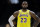 Los Angeles Lakers forward LeBron James looks on during the first half of an NBA preseason basketball game against the Denver Nuggets Sunday, Sept. 30, 2018, in San Diego. (AP Photo/Gregory Bull)