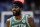 Boston Celtics' Kyrie Irving reacts during the second half of an NBA preseason basketball game against the Charlotte Hornets in Chapel Hill, N.C., Friday, Sept. 28, 2018. Charlotte won 104-97. (AP Photo/Gerry Broome)