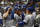 Los Angeles Dodgers' Justin Turner (10) celebrates with manager Dave Roberts (30) after hitting a two-run home run during the eighth inning of Game 2 of the National League Championship Series baseball game against the Milwaukee Brewers Saturday, Oct. 13, 2018, in Milwaukee. (AP Photo/Jeff Roberson)