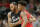 SAN ANTONIO,TX - DECEMBER 25:  Kawhi Leonard #2 of the San Antonio Spurs greets Jimmy Butler #21 of the Chicago Bulls at the start of the game at AT&T Center on December 25, 2016 in San Antonio, Texas.  NOTE TO USER: User expressly acknowledges and agrees that , by downloading and or using this photograph, User is consenting to the terms and conditions of the Getty Images License Agreement. (Photo by Ronald Cortes/Getty Images)