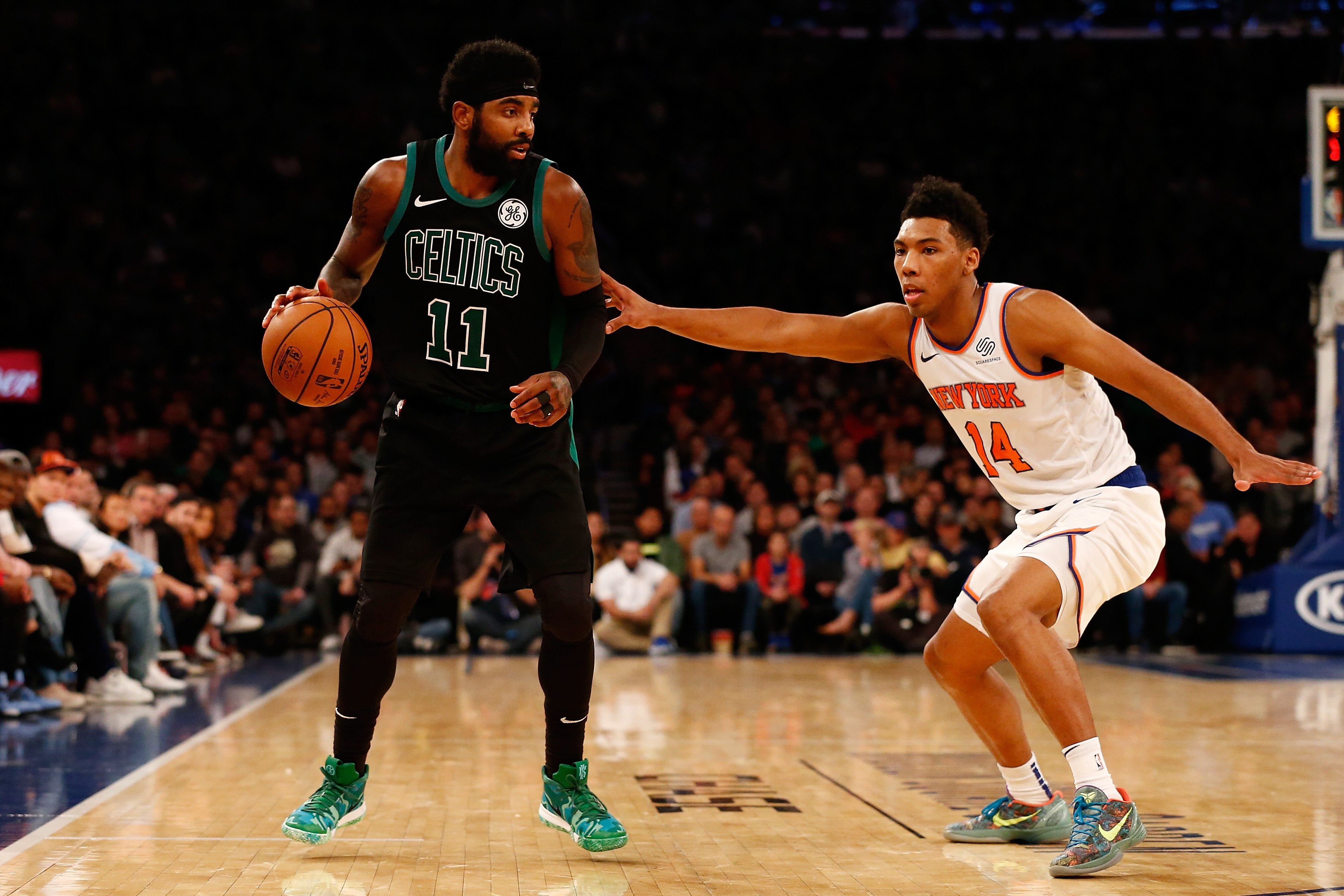 NEW YORK, NY - OCTOBER 20: Kyrie Irving #11 of the Boston Celtics drives to the net against Allonzo Trier #14 of the New York Knicks at Madison Square Garden on October 20, 2018 in New York City. (Photo by Mike Stobe/Getty Images)