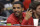 Singer Drake watches the Toronto Raptors play the Los Angeles Clippers during the first half of an NBA basketball game, Friday, Feb. 7, 2014, in Los Angeles. (AP Photo/Mark J. Terrill)