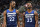 SAN ANTONIO,TX - OCTOBER 17 :  Andrew Wiggins #22 of the Minnesota Timberwolves and Jimmy Buttler talk after a foul called against the San Antonio Spurs in season opener at AT&T Center on October 17 , 2018  in San Antonio, Texas.  NOTE TO USER: User expressly acknowledges and agrees that , by downloading and or using this photograph, User is consenting to the terms and conditions of the Getty Images License Agreement. (Photo by Ronald Cortes/Getty Images)