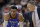 Oklahoma City Thunder guard Russell Westbrook (0) and Oklahoma City Thunder head coach Billy Donovan talk during a free throw in second half of an NBA basketball game against the Houston Rockets Saturday, April 7, 2018, in Houston. (AP Photo/Michael Wyke)