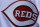 A Cincinnati Reds player wears a logo honoring those killed at Sandy Hook Elementary School during a major league baseball game against the Los Angeles Angels, Monday, April 1, 2013, in Cincinnati. (AP Photo/David Kohl)