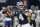 Dallas Cowboys quarterback Dak Prescott (4) works against the Tennessee Titans during the second half of an NFL football game, Monday, Nov. 5, 2018, in Arlington, Texas. (AP Photo/Michael Ainsworth)