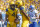 West Virginia Mountaineers wide receiver Dominique Maiden (82) talks with West Virginia Mountaineers running back Leddie Brown (4) during the second half of an NCAA college football game between the West Virginia Mountaineers and University of Kansas Jayhawks in Morgantown, W. Va., Saturday Oct. 6, 2018. The Mountaineers defeated the Jayhawks with a final score of 38-22. (AP Photo/Craig Hudson)