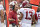 FAYETTEVILLE, AR - OCTOBER 6:  Head Coach Nick Saban talks with Tua Tagovailoa #13 of the Alabama Crimson Tide as he comes off the field in the first quarter of a game against the Arkansas Razorbacks at Razorback Stadium on October 6, 2018 in Tuscaloosa, Alabama.  The Crimson Tide defeated the Razorbacks 65-31.  (Photo by Wesley Hitt/Getty Images)