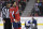 FILE - In this Sept. 30, 2018, file photo, Washington Capitals right wing Tom Wilson (43) is escorted by an official off the ice after he checked St. Louis Blues center Oskar Sundqvist, background, during the second period of an NHL preseason hockey game in Washington. Wilson has had his 20-game suspension reduced to 14 by a neutral arbitrator and is eligible to play immediately. Wilson has already served 16 games of his suspension for an illegal check to the head of St. Louis forward Oskar Sundqvist in each team’s preseason finale. The ruling by Shyam Das allows Wilson to return as soon as Tuesday night, Nov. 13, 2018, at Minnesota, and the 24-year-old will recoup $378,049 of the $1.26 million he initially forfeited as part of the suspension. (AP Photo/Nick Wass, File)