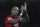 Manchester United's Ashley Young applauds the fans as he leaves the pitch after the end of the English Premier League soccer match between Manchester United and Newcastle United at Old Trafford in Manchester, England, Saturday, Oct. 6, 2018. Man United won the match 3-2. (AP Photo/Jon Super)