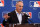 FILE - In this Nov. 16, 2017, file photo, baseball Commissioner Rob Manfred speaks during a news conference at the annual MLB owners meetings in Orlando, Fla. A person familiar with the agenda tells The Associated Press that owners plan to vote on a new term for Manfred, a new television contract with Fox and an agreement for in-game cut-ins with the subscription video streaming service DAZN when they meet next week in Atlanta. (AP Photo/John Raoux, File)