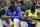 Golden State Warriors' Kevin Durant, left, and Draymond Green sit on the bench during the first half of an NBA basketball game against the Houston Rockets Thursday, Nov. 15, 2018, in Houston. (AP Photo/David J. Phillip)