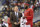 Washington Wizards head coach Scott Brooks, left, talks with Washington Wizards guard John Wall, right, during the second half of an NBA basketball game against the Miami Heat, Thursday, Oct. 18, 2018, in Washington. The Heat won 113-112. (AP Photo/Nick Wass)