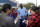 Charlotte Hornets owner Michael Jordan greets people and hands out food for Thanksgiving to members of the community in Wilmington, N.C., Tuesday, Nov. 20, 2018. (AP Photo/Gerry Broome)